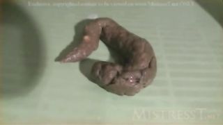 Green turd in close up