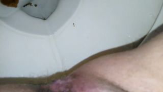 Amateur girl taking a shit and piss