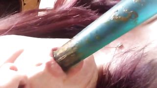 Redhead licking a shitty dildo