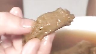 Eating scat for her first time