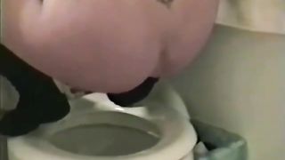 Cleaning her own shit