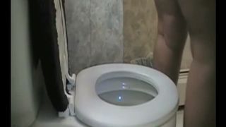 BBW girl sits on the toilet