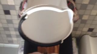 Poop in a white bucket