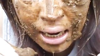 Asian girl eating scat