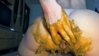 Fisting her own scat