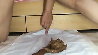 Long turd from her ass