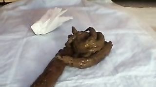 Long turd from her ass